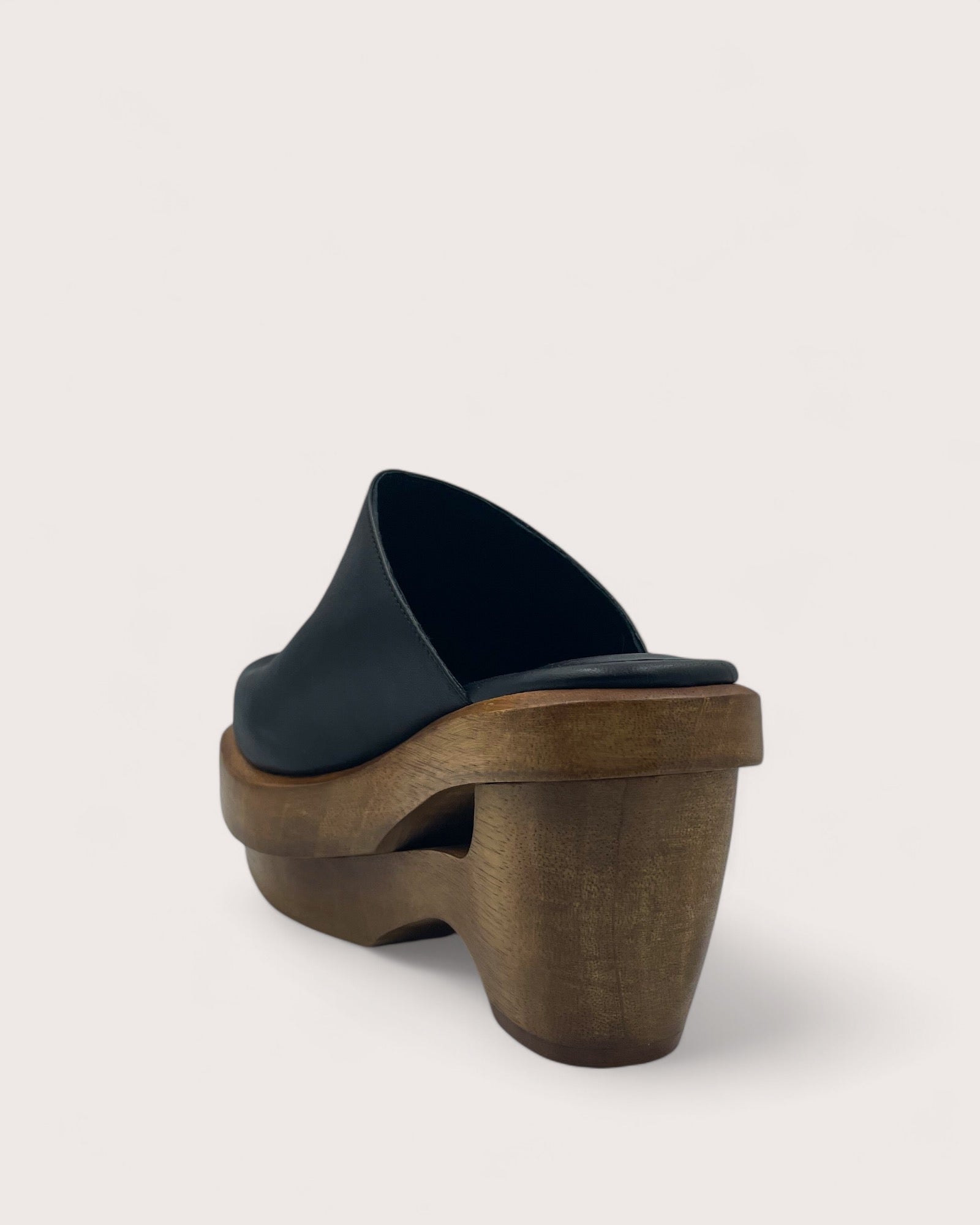 535A Bond Carter Leather and Wood Clog Shoes in Black Three Quarter Back View