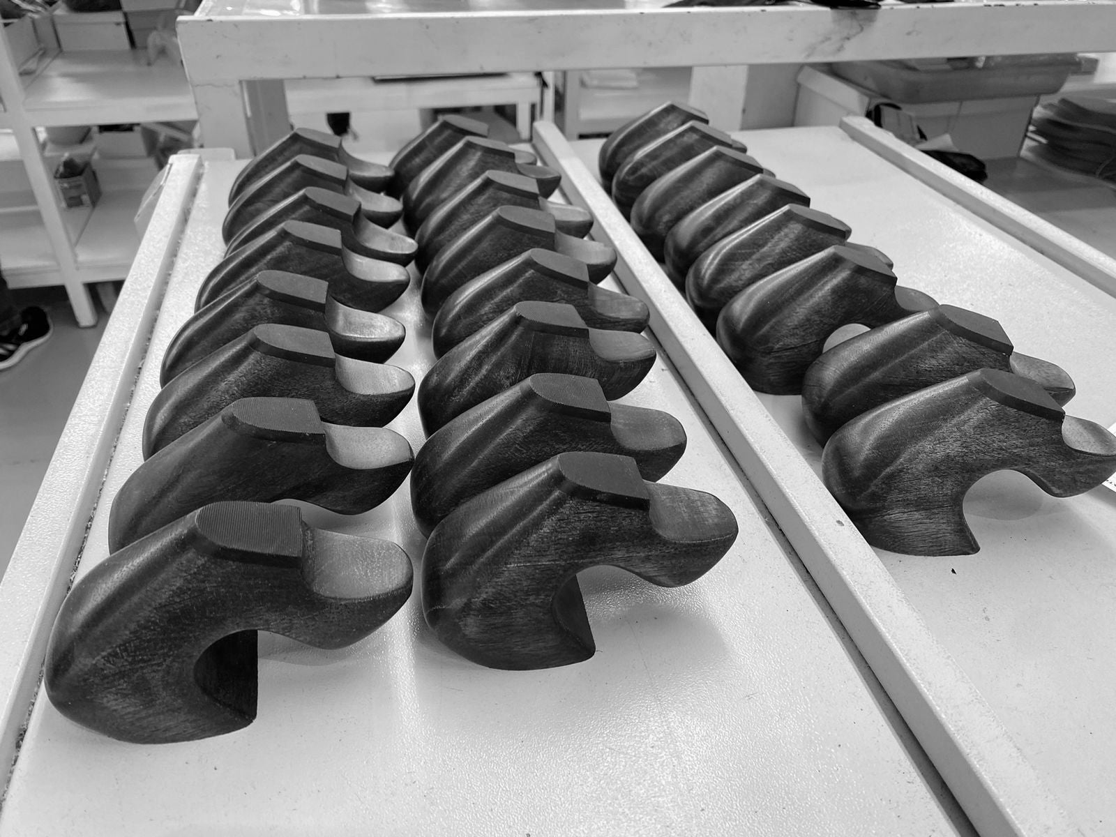 535A Bond sculptural heels lined up in factory